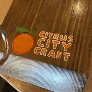 orange on wooden cutting board