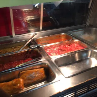 a buffet with a variety of food items