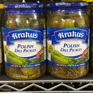 pickles in jars on a shelf