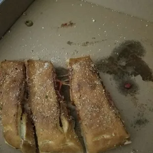 Calzone half eaten, too bad they don&apos;t cut it on half