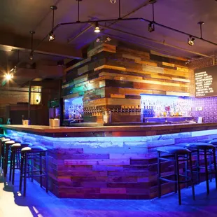 a bar with blue lighting