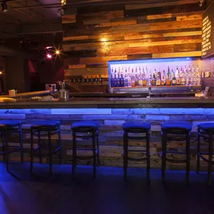 a bar with bar stools