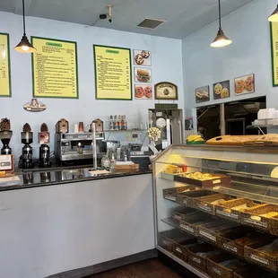 Menu boards &amp; fresh bagels/baked goods on display!