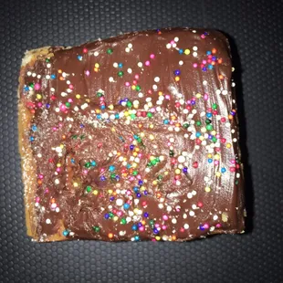 Party for one!! Yellow cake with chocolate frosting and sprinkles.