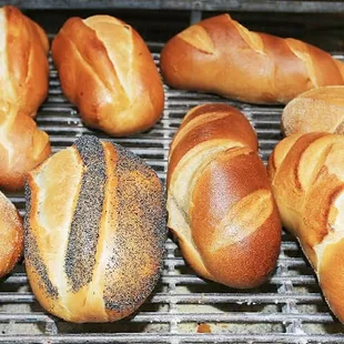 a variety of breads on a grill