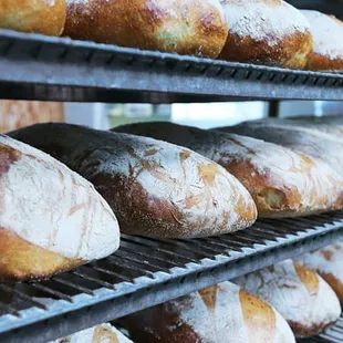 a rack of freshly baked breads