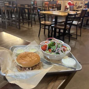 Pulled pork sandwich and side salad. $2.25 for dinner.
