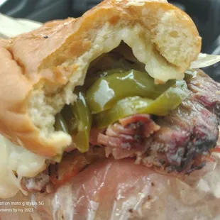 Kid Brisket sandwich added peppers, onions, and provolone! Delicious lunch 06/27/2023