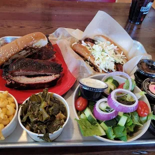 Clockwise: ribs and chicken, smoked sausage, salad, colored greens and mac'n'cheese.