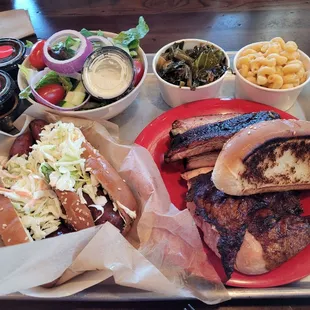Another view. Clockwise: salad, colored greens, mac'n'cheese, chicken and ribs and the smoked sausage.
