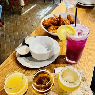 beer flight, dry rub wings and ultraviolet cocktail.