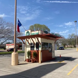 Lil coffee stand in parking lot
