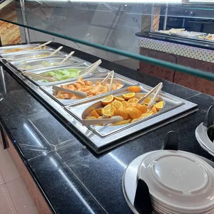 a buffet with a variety of food items