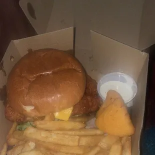 Sandwich, fries, and a couple macaroni bites.