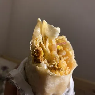 A very bad picture of a very good burrito.