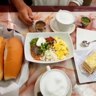 Classic Fuul Breakfast(can be served Vegan) with Cappuccino and slice of vanilla rum cake