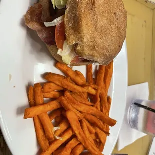 Turkey burger and sweet potato fries-I ate a bite from my burger and half of the fries before I remembered to take a picture
