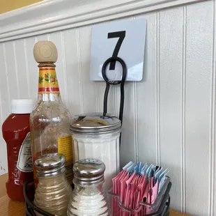 a basket of condiments and condiments