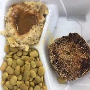 Salmon patty ( yes you only get one), mashed potatoes and gravy, and Lima bean...salmon patty is very dry