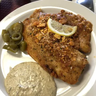 Baked Tilapia - It has so much flavor and fish is cooked to perfection (very soft yet juicy)