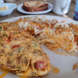 Chorizo omelet with hashbrowns and toast