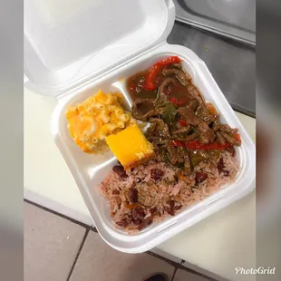 a meal in a styrofoam container