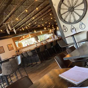 a view of the bar and dining area