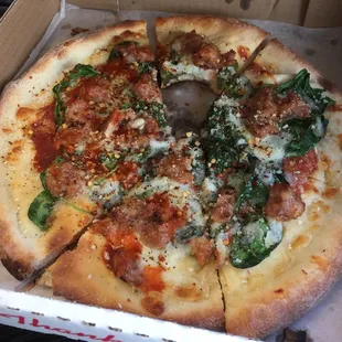 Lunch pizza. Spinach sausage