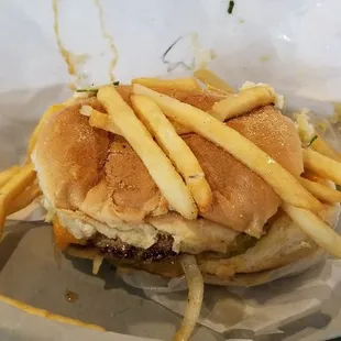 a hamburger and fries in a basket