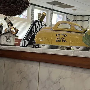 a taxi cab on the counter