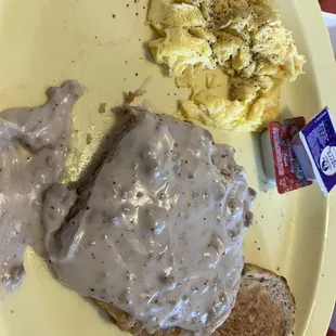 Thats sausage Gravy on the chicken fried steak. Bad pic (sorry IT WAS NIT GRAY) tasted Amazing