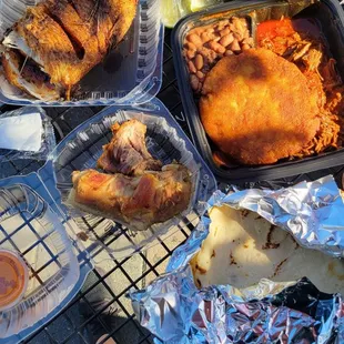 Whole fried fish, stewed beef with pinto beans and potato cake, tortillas and pork