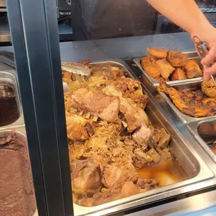 Pork shoulder,  fried fish, chicken leg, potato pancakes