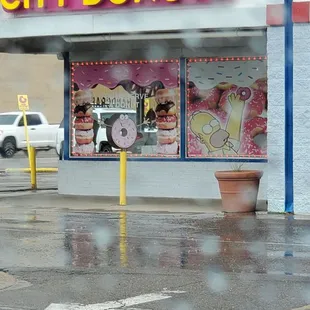 the outside of a donut shop