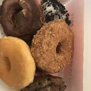 a variety of doughnuts in a box