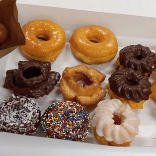 a variety of doughnuts in a box