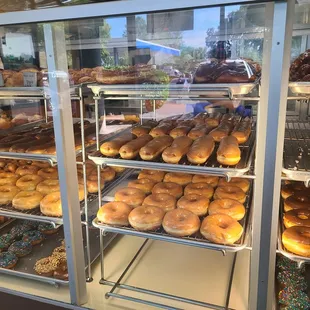 a display case full of doughnuts