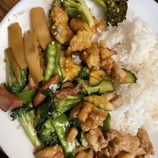 General Tsao&apos;s chicken, bbq pork and snow peas and kung pao chicken with steamed white rice.