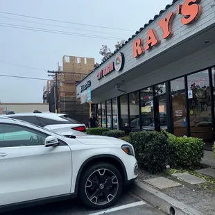 a car parked in front of a store