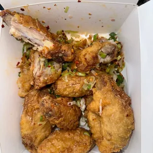 fried chicken wings in a box