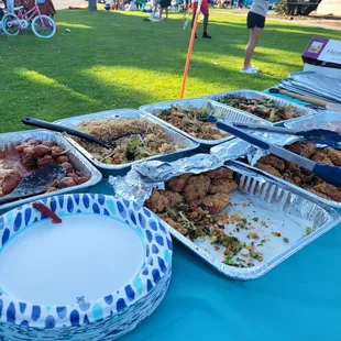 One of their party packs with an order of 50 extra wings. Orange chicken, fried rice, chow mein, beef and Broccoli, fried donut balls.