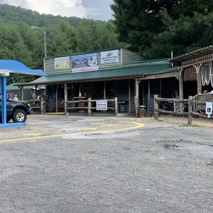 a car parked in front of a restaurant