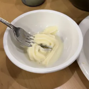 a plate of pasta and a fork