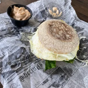 a sandwich with a side of mustard