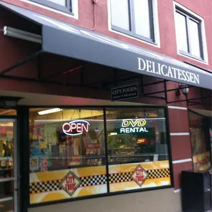 a deli restaurant on a city street