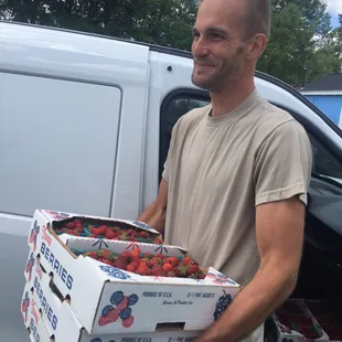 Pete, City Fresh Farm Liaison bringing local berries daily to our sign-up events.