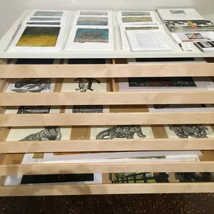 Prints for sale in the gift portion of the gallery.