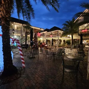 a lighted snowman in a courtyard
