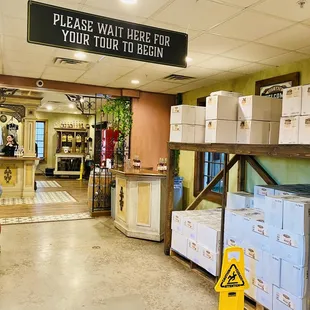 a yellow caution sign in a store