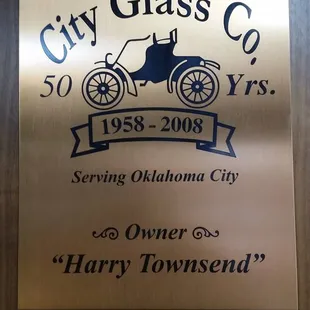 Plaque celebrating the 50 years in one location.